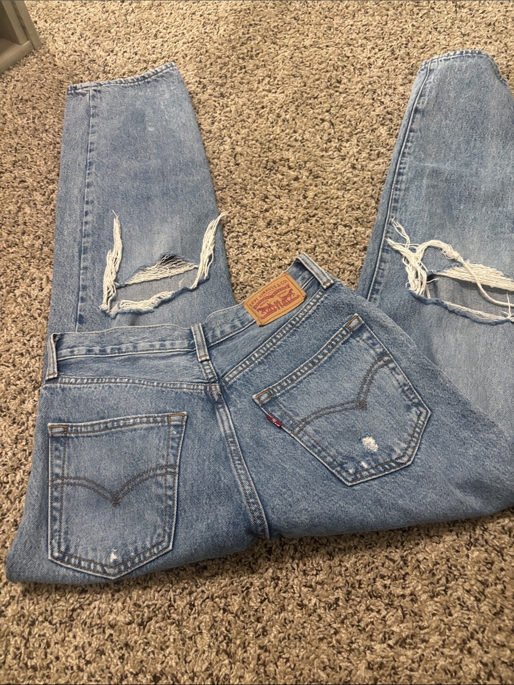 Levi's light blue distressed 501 jeans